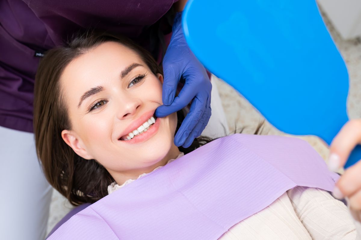 Patient smiling after dental bonding treatment at Prana Integrative Dental Wellness
